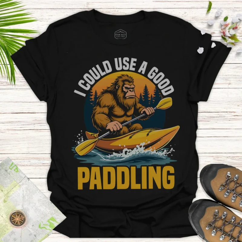 Paddling T-Shirt — “I Could Use a Good Paddling” Kayak Sasquatch Tee