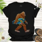 Sasquatch Surfer T-Shirt — Retro Bigfoot with Hawaiian Surfboard Tee - black