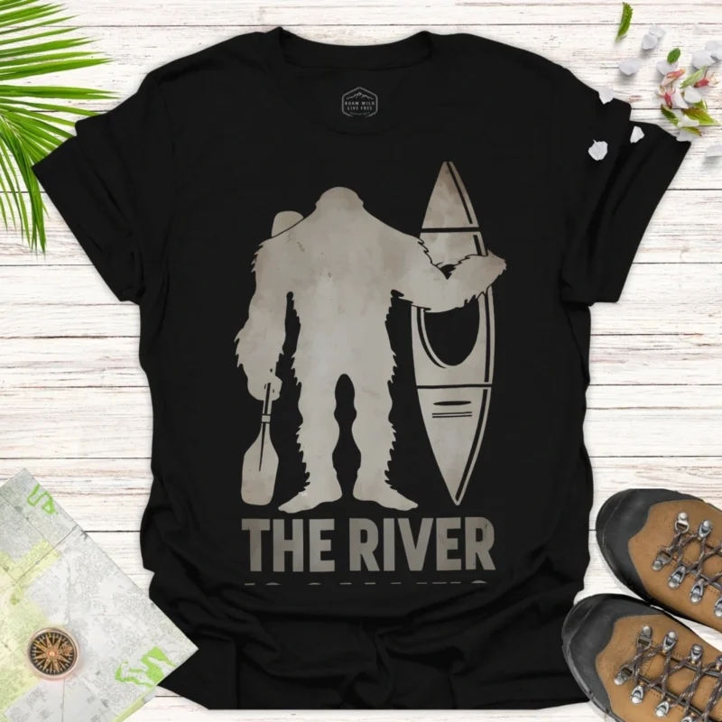 The River Sasquatch Canoe T-Shirt — Outdoor Adventure Graphic Tee - black
